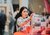 Girl looking at brochures