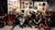 Students in front of artworks