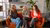 Image of three girls sitting on a couch in the Living Room on campus