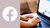 image of laptop user hands next to a Facebook icon