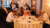 Group of people working together at table