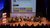 An overview photo of the speakers and moderator of the second panel