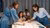 People doing group work at table