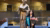 Photo of Gitasanti with diploma and Erasmus statue